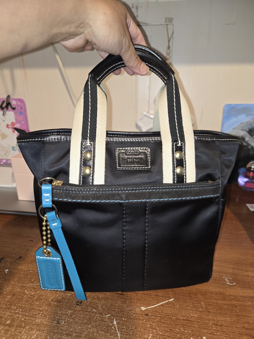 Coach Black Nylon Tote with Cream Handles and Turquoise Tag